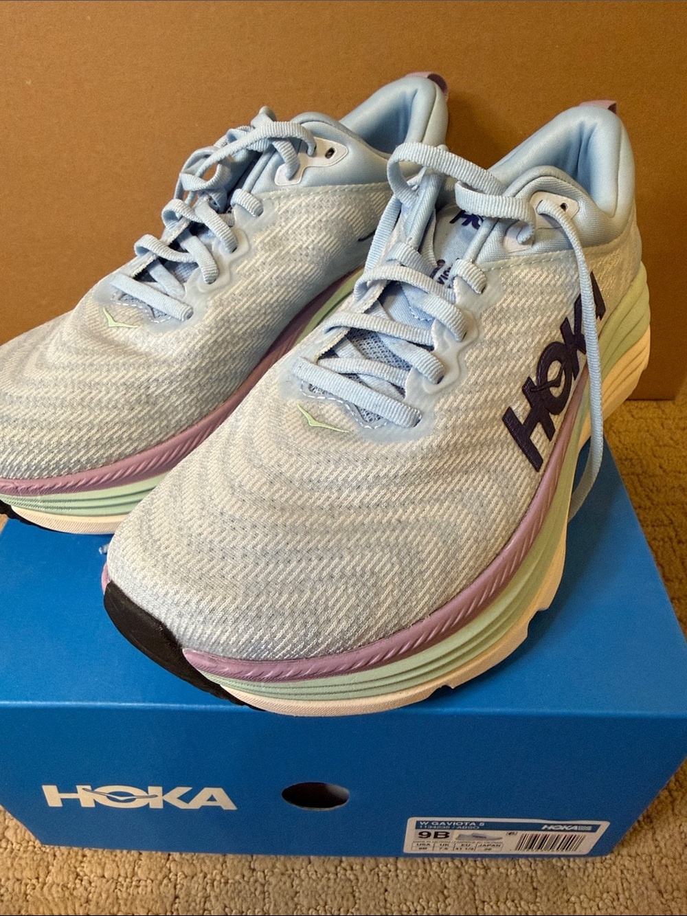 Hoka Women's Pastel Blue Running Shoes with Multicolor Midsole
